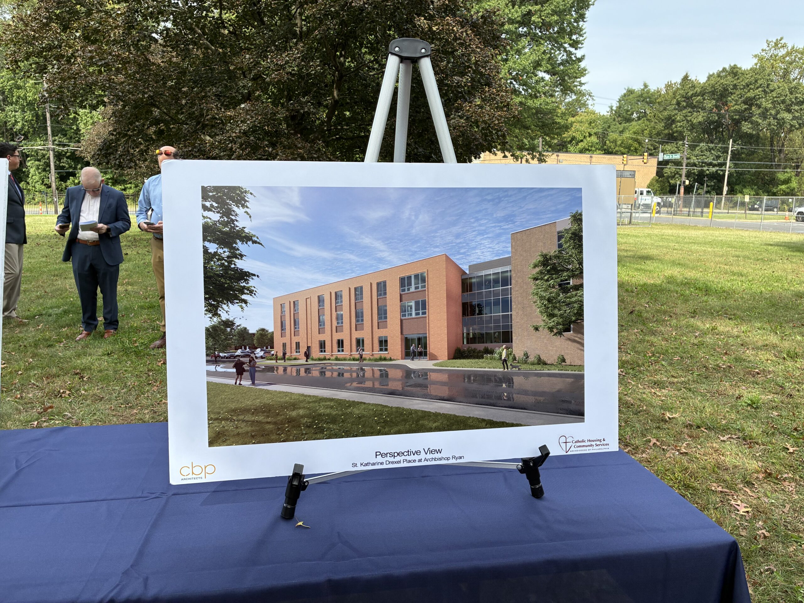 an architectural rendering of an apartment building in warm brick tones